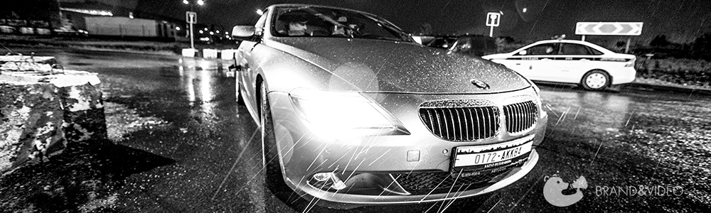 BMW 6 купе во время дождя на съемках видео, кадр из фильма Цензор